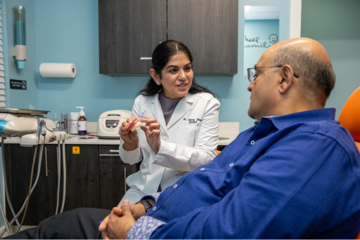 Dentist consulting with a patient